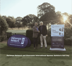 Two men on a putting green with Pertemps Network and Clearwater International Corporate Banners