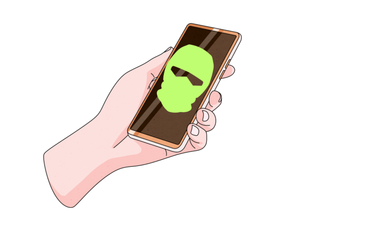 A Hand holding a mobile phone. The phone has a picture of a complete face mask - hiding the caller's identity